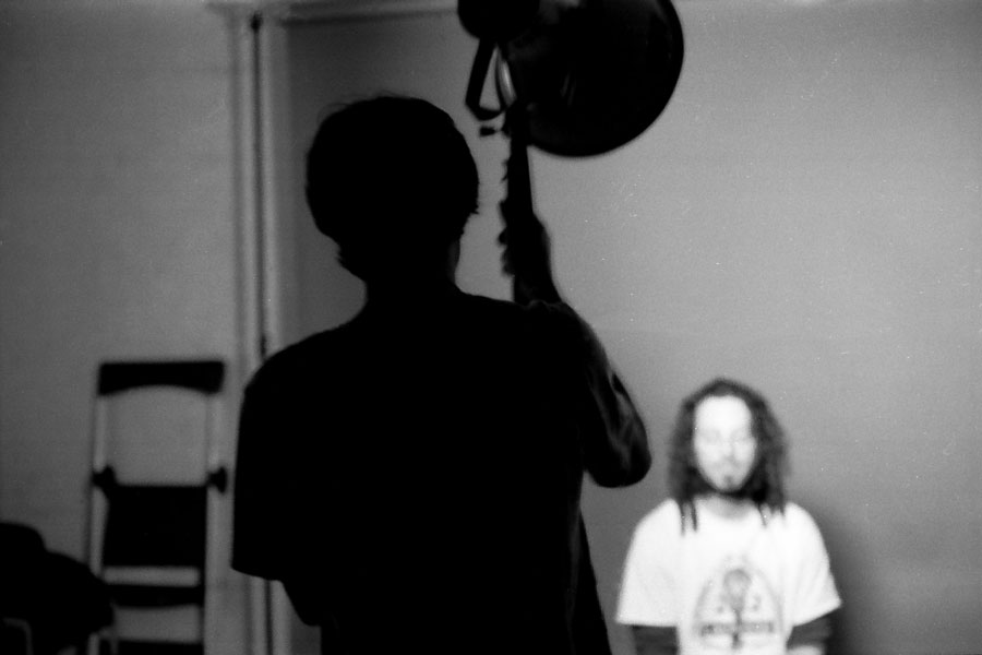 Students Setting Up Lighting for an in studio Photos Shoot